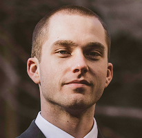 暗号市場の専門家でありトレーディングアナリストである Thomas Whitfield のポートレート
